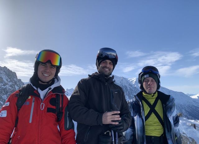Skiing selfie with mountains behind